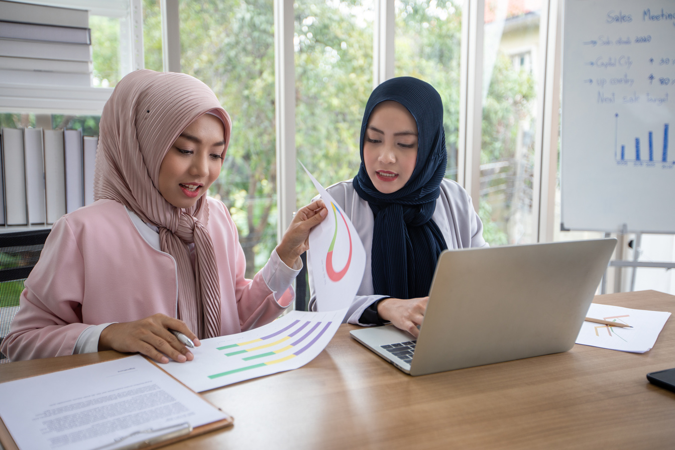 Women in Hijab Working at Office
